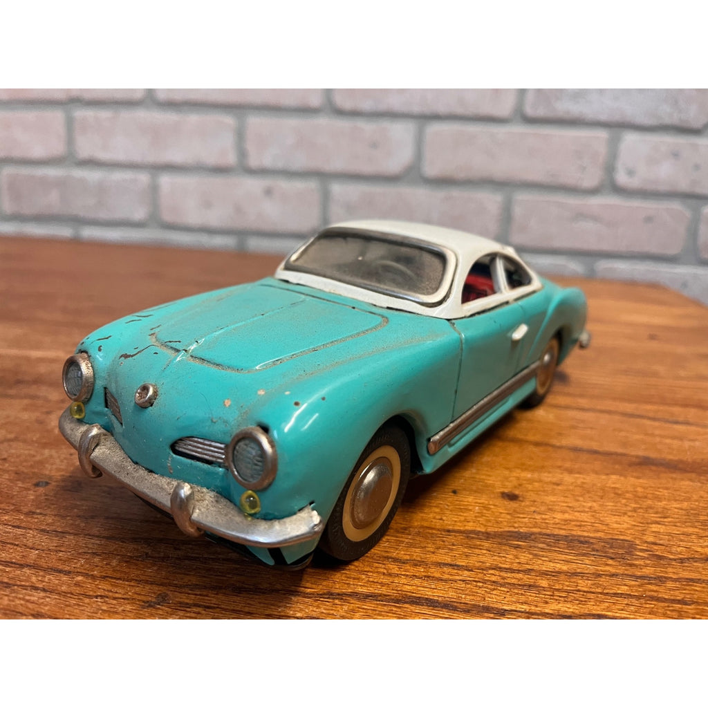 Vintage 1950s Volkswagen Karmann Ghia MF-743 Tin Friction Toy Car Sedan Aqua