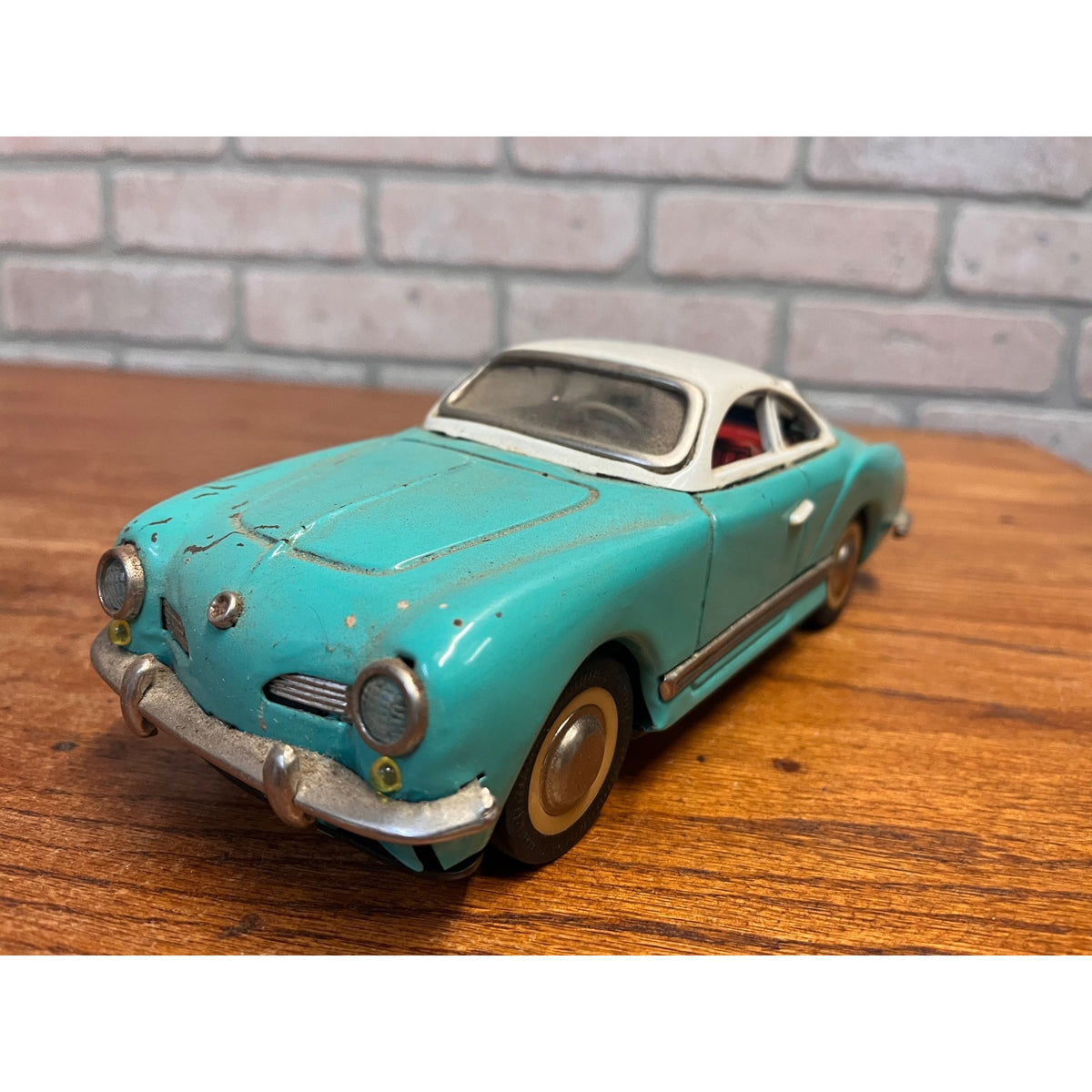 Vintage 1950s Volkswagen Karmann Ghia MF-743 Tin Friction Toy Car Sedan Aqua