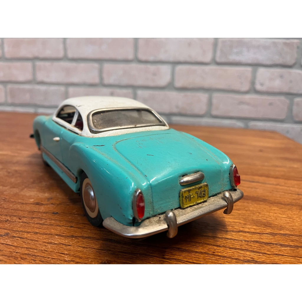 Vintage 1950s Volkswagen Karmann Ghia MF-743 Tin Friction Toy Car Sedan Aqua
