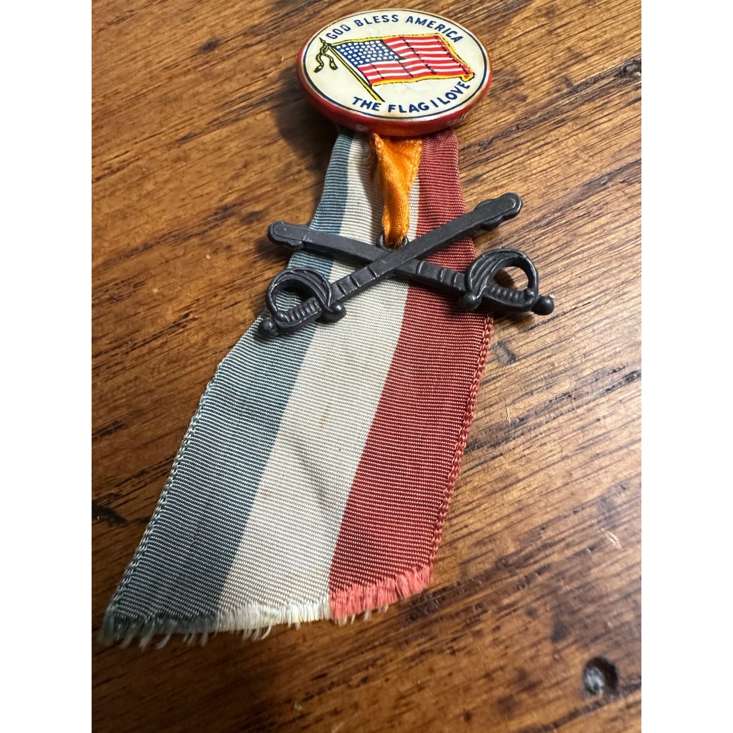 Vintage WWII Homefront Patriotic Pinback Ribbon God Bless Flag Crossed Swords