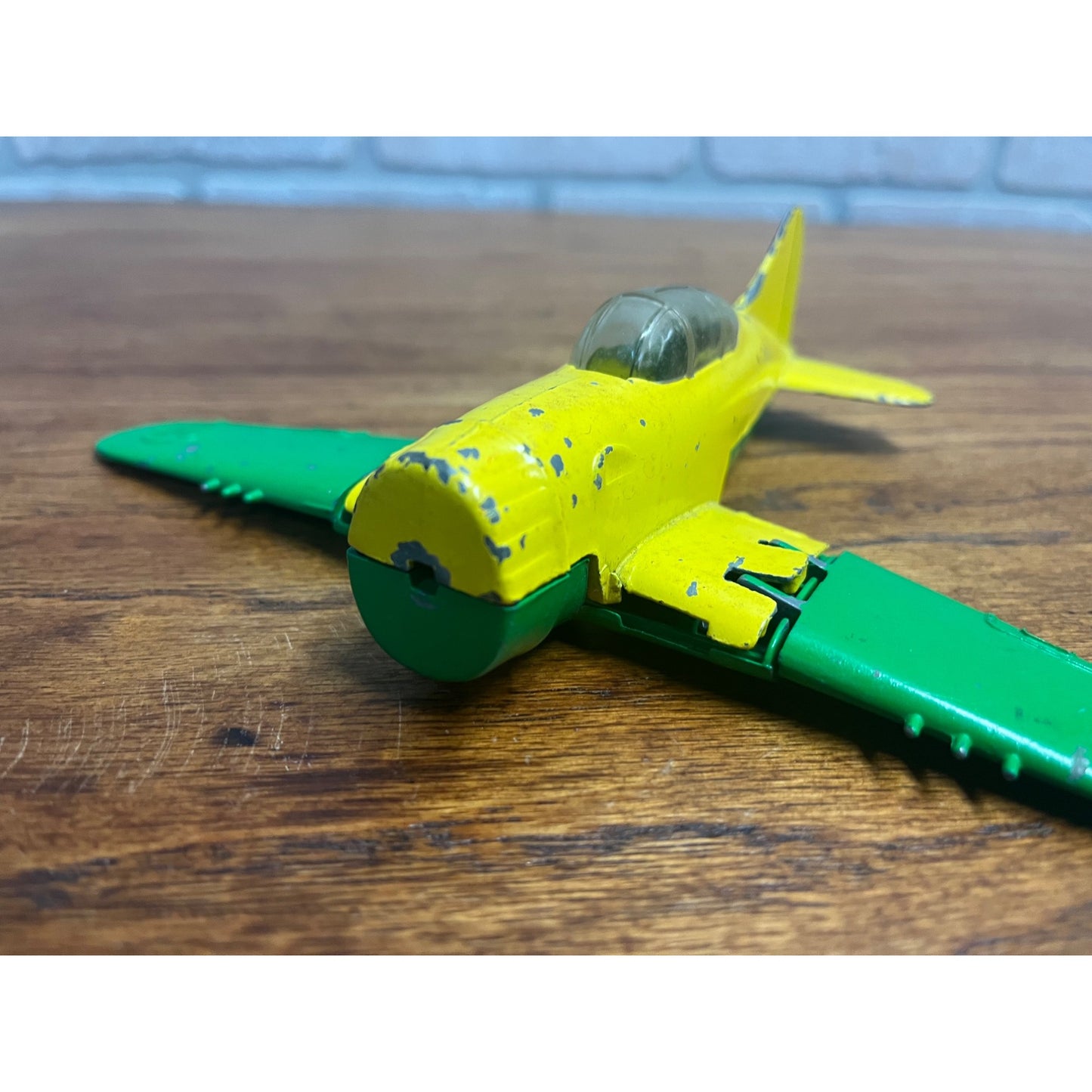 Vintage Hubley Kiddie Toy Die-cast Plane with Folding Wings Wheels Green Yellow