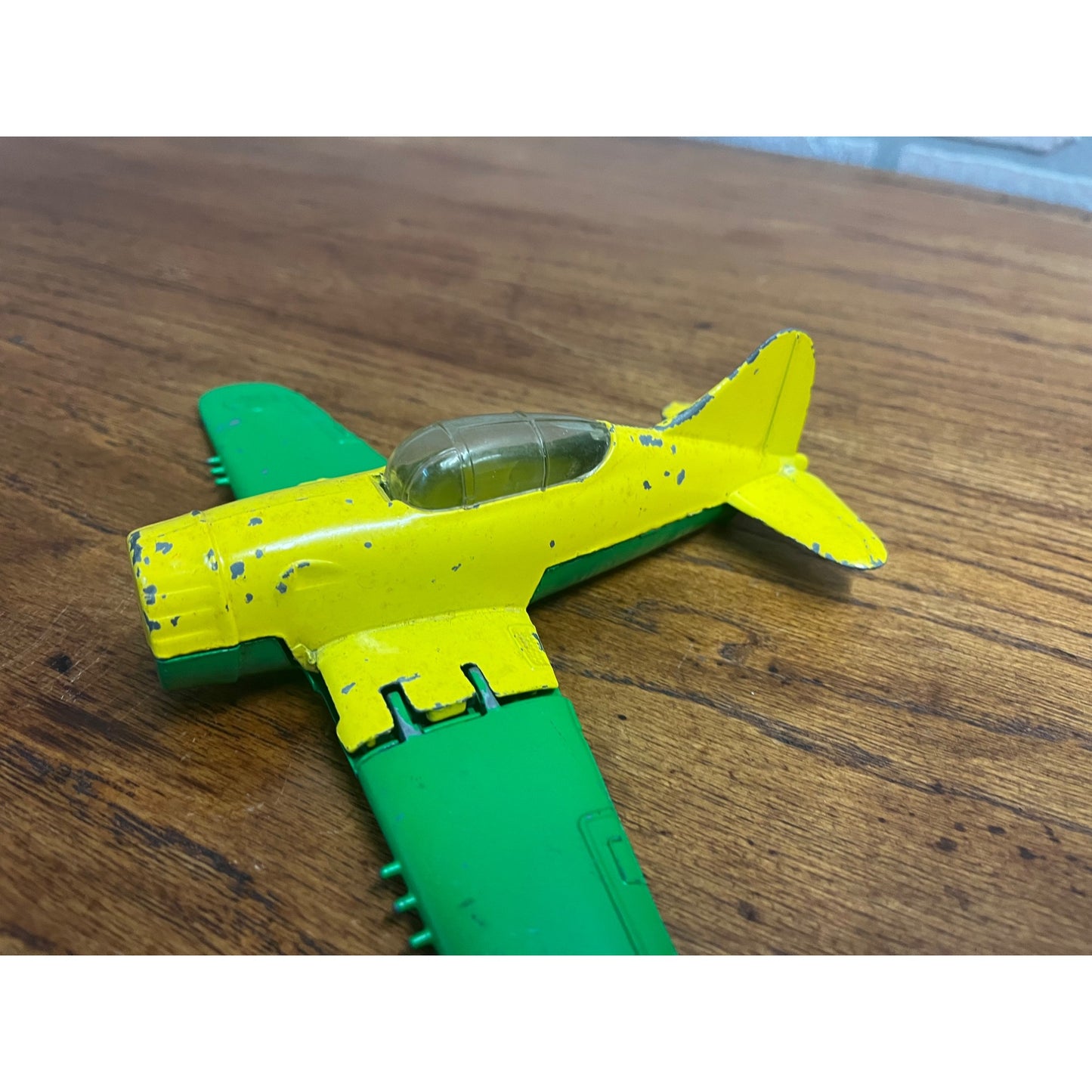 Vintage Hubley Kiddie Toy Die-cast Plane with Folding Wings Wheels Green Yellow