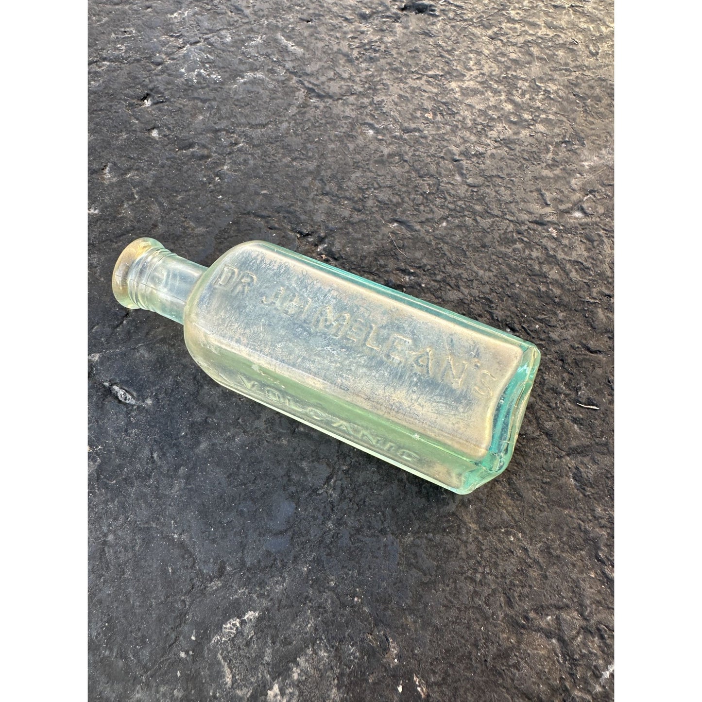 Antique Embossed McLeans Volcanic Liniment Oil Bottle Aqua Blue green