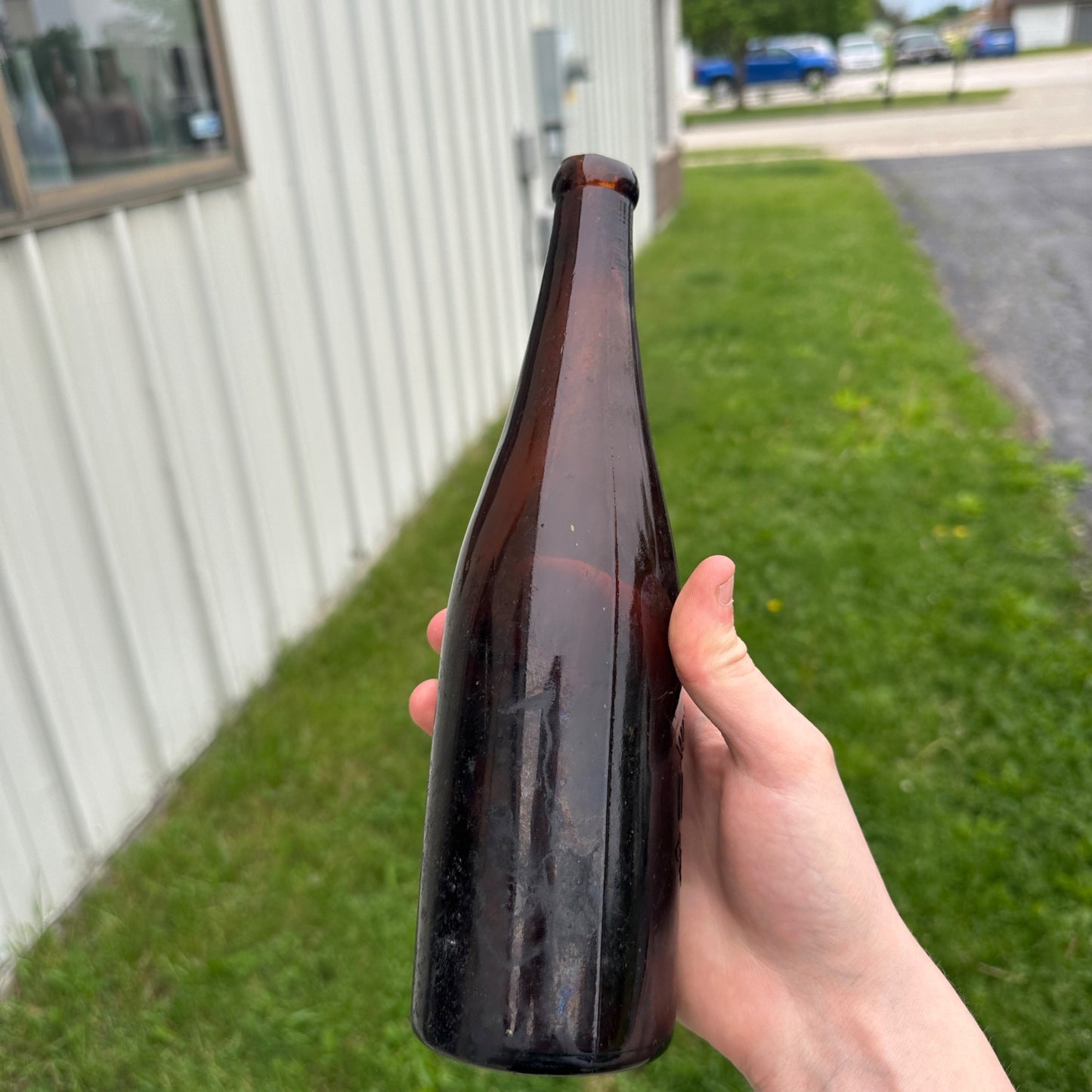 VINTAGE WEST BEND LITHIA CO EMBOSSED BEER BOTTLE WEST BEND WI Blob