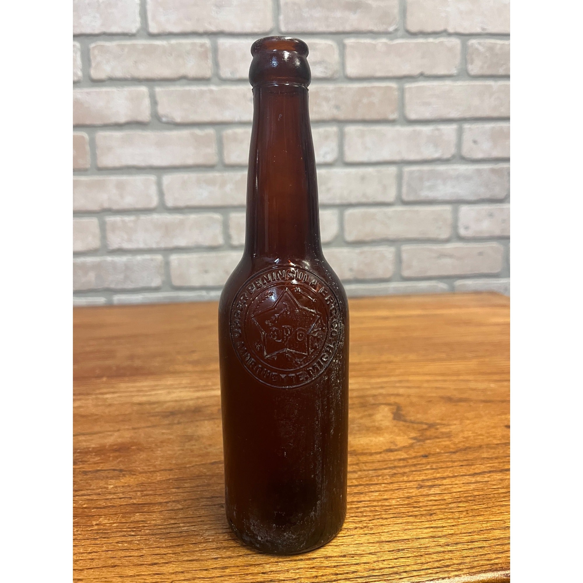 Vintage Upper Peninsula Brewing Co Marquette MI Beer Bottle Amber Embossed