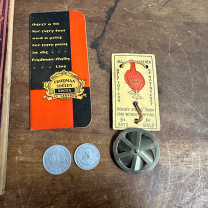 ANTIQUE RED GOOSE SHOES LOT BOOK NOTEPAD STRING GAME SPINNER COINS