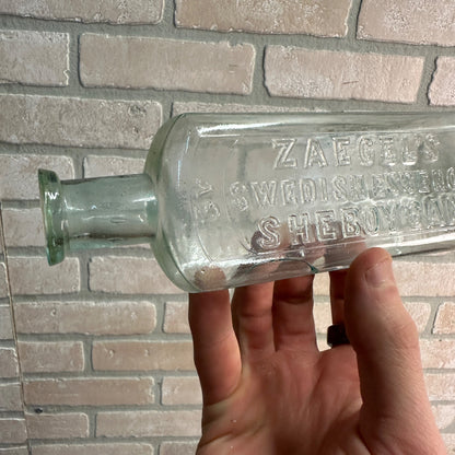 ANTIQUE VINTAGE ZAEGEL'S ESSENCE SHEBOYGAN WISCONSIN AQUA MEDICINE BOTTLE EMBOSSED