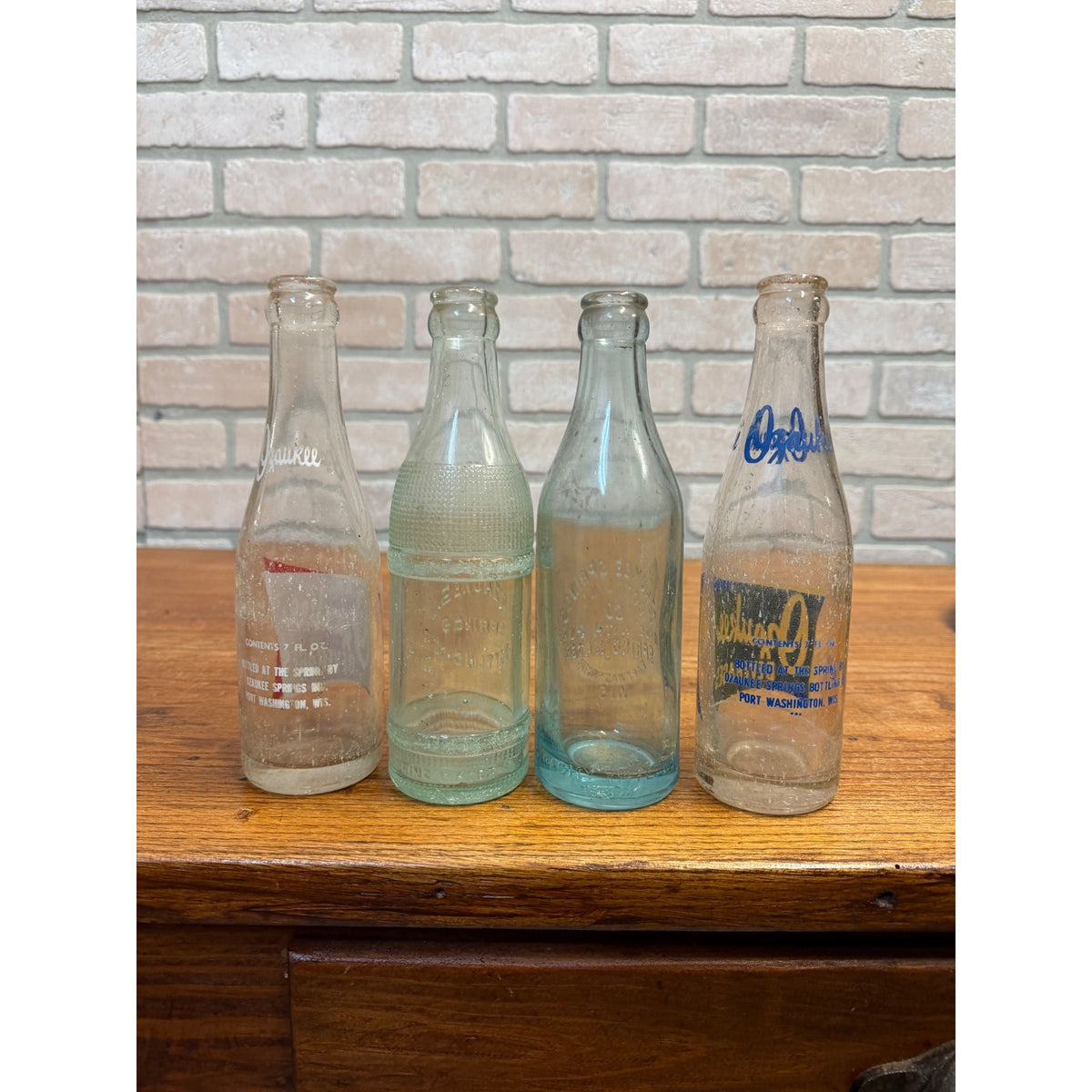 (4) Ozaukee Springs Bottling Co Port Washington Wis Wisconsin Soda Bottle