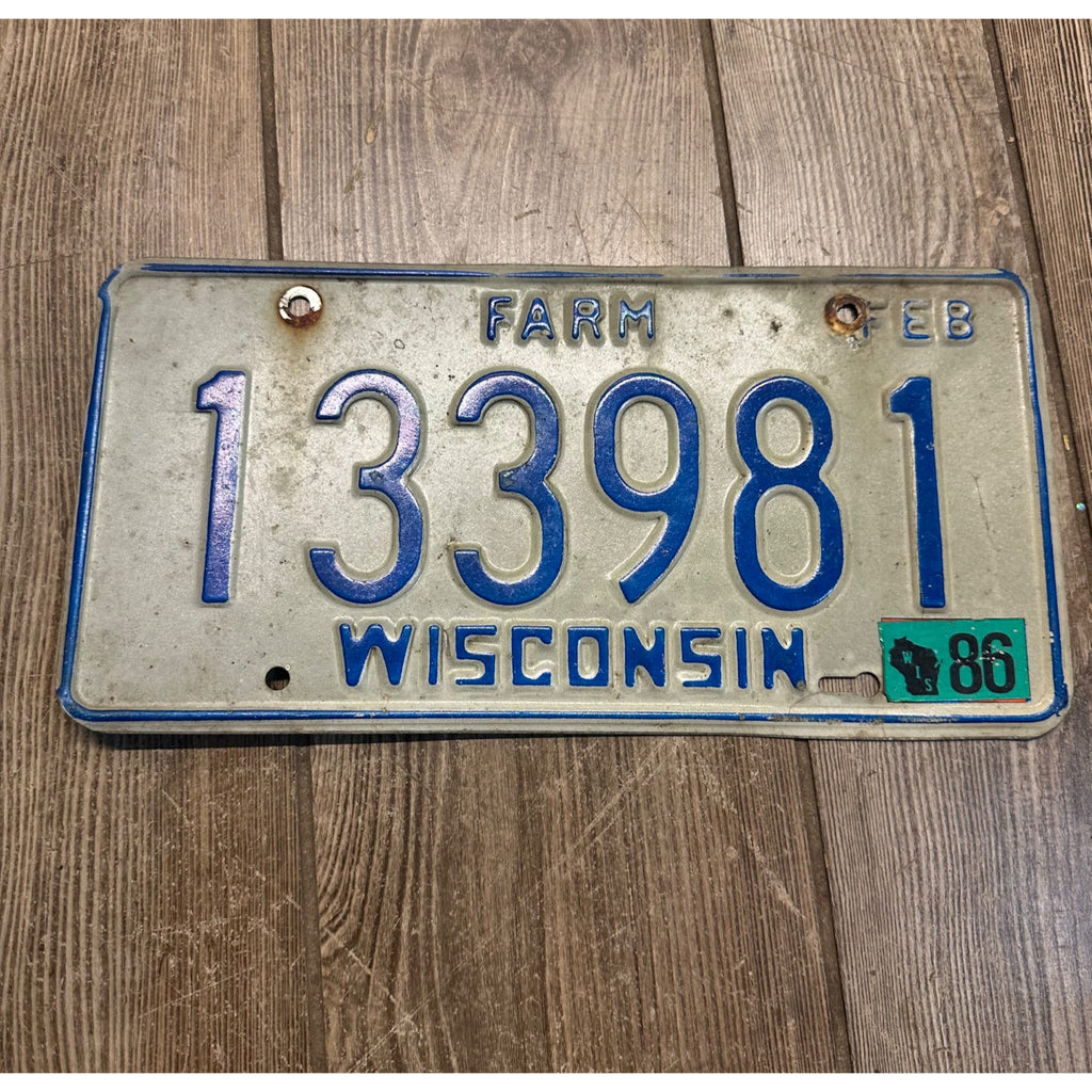 Vintage 1986 Wisconsin Embossed License Plate Blue White Farm