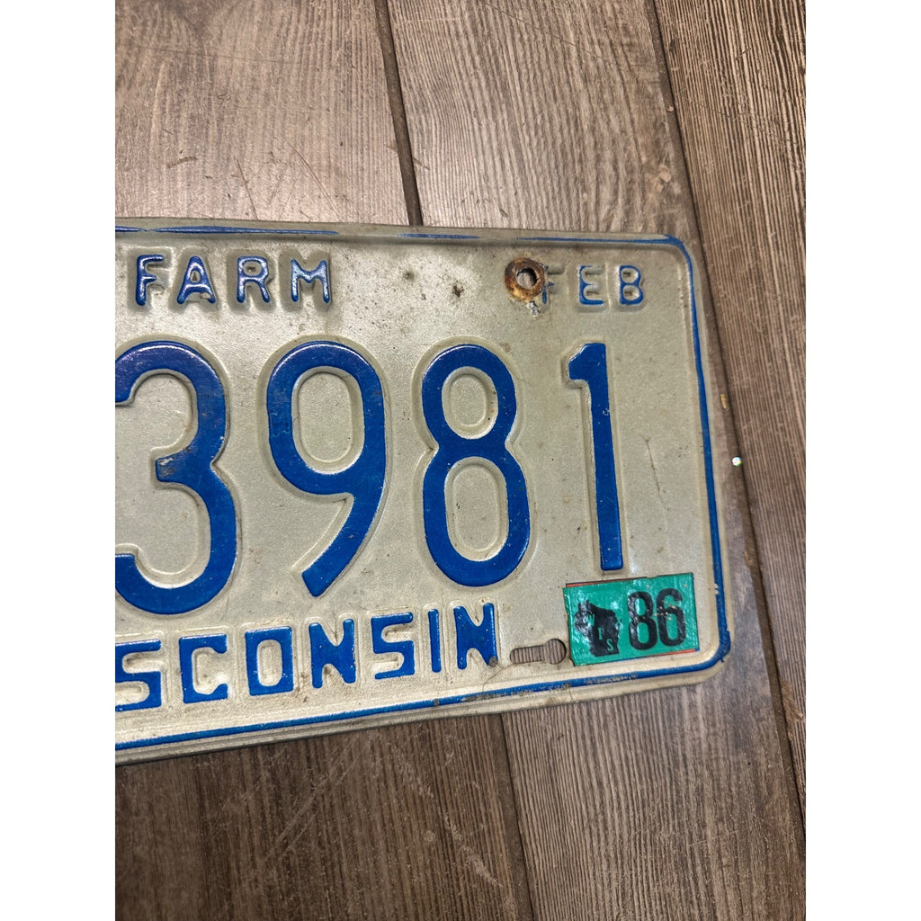 Vintage 1986 Wisconsin Embossed License Plate Blue White Farm