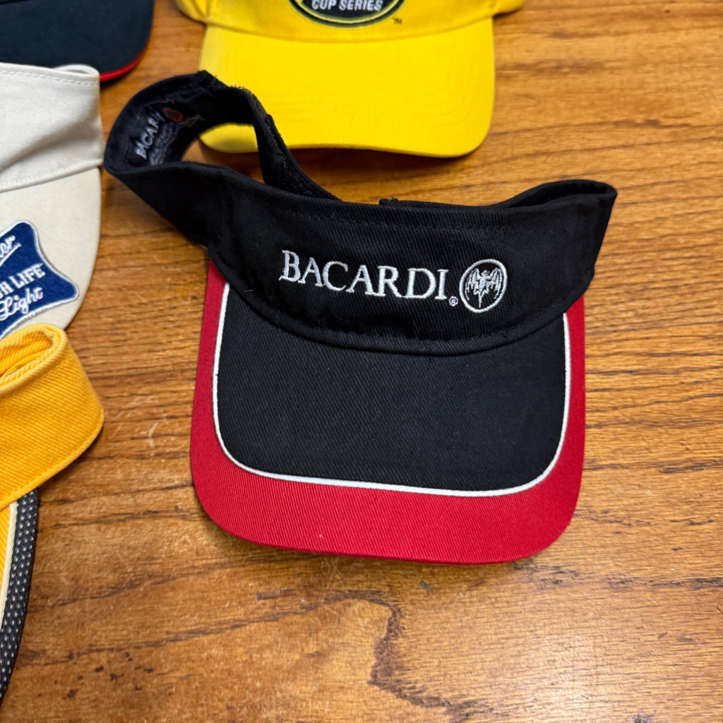 Lot Of 7 Vintage Logo Visors Featuring Bacardi Miller Genuine Draft NASCAR Adidas Bandits