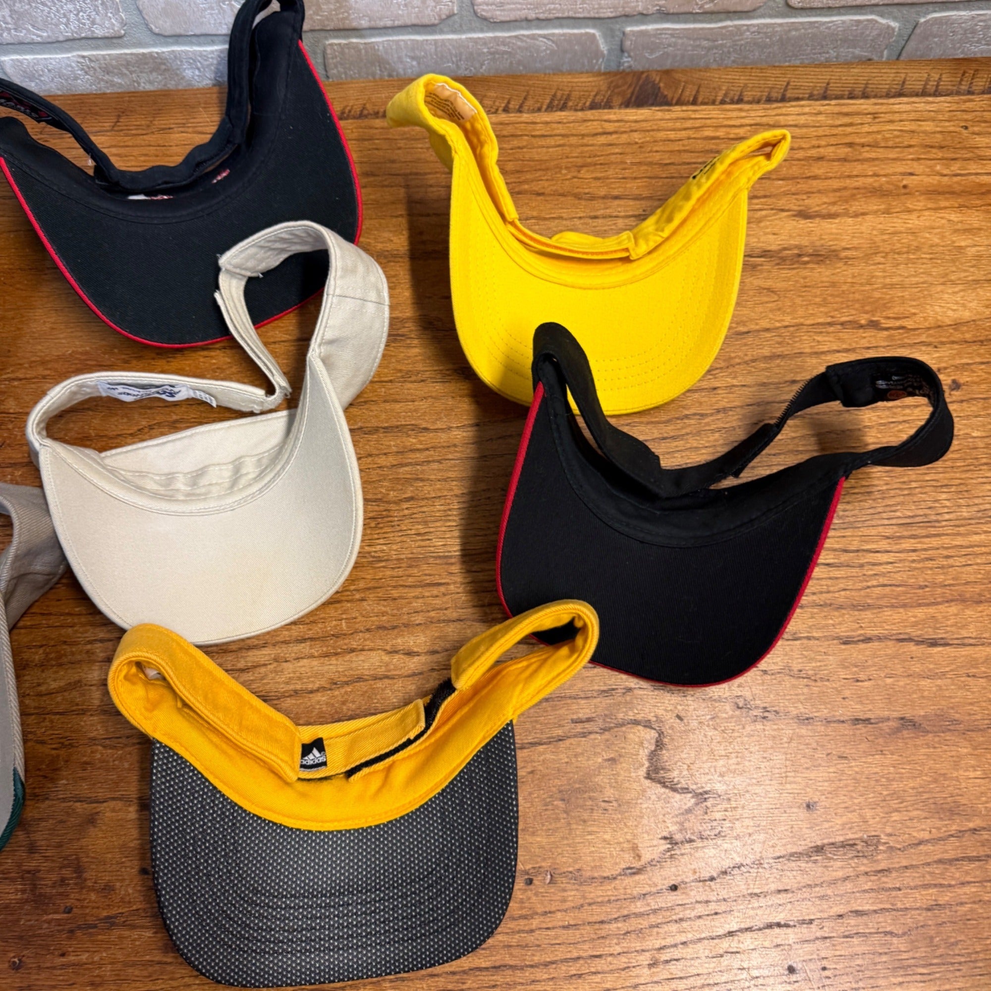 Lot Of 7 Vintage Logo Visors Featuring Bacardi Miller Genuine Draft NASCAR Adidas Bandits