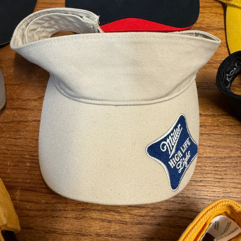 Lot Of 7 Vintage Logo Visors Featuring Bacardi Miller Genuine Draft NASCAR Adidas Bandits