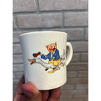 Vintage Children's Drinking Cup Glazed Pottery Mug Pig Riding Mother Goose Circa 1930 Syracuse China?