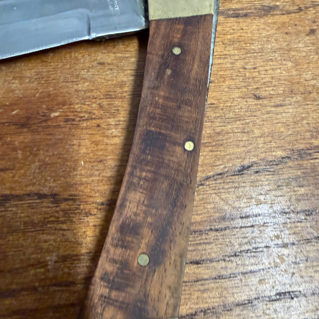 Vintage Stainless Steel Folding Knife With Brass-Accented Wooden Handle and Black Leather Sheath