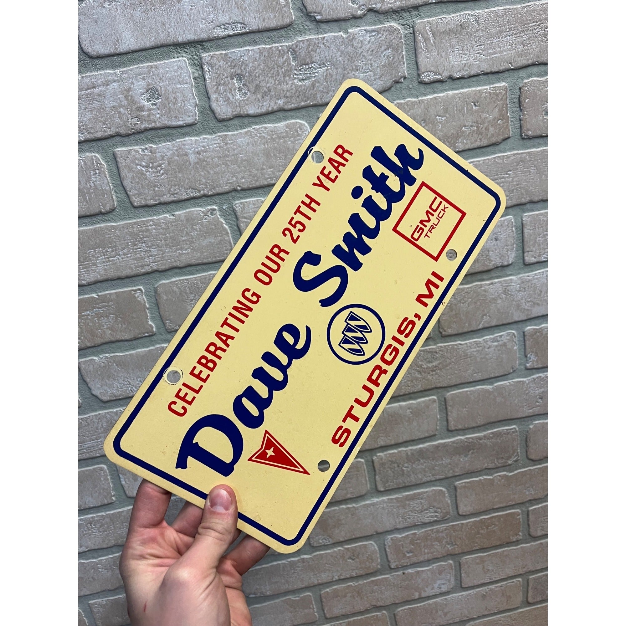Vintage Dave Smith Buick GMC Trucks Strugis MI Dealership Booster License Plate