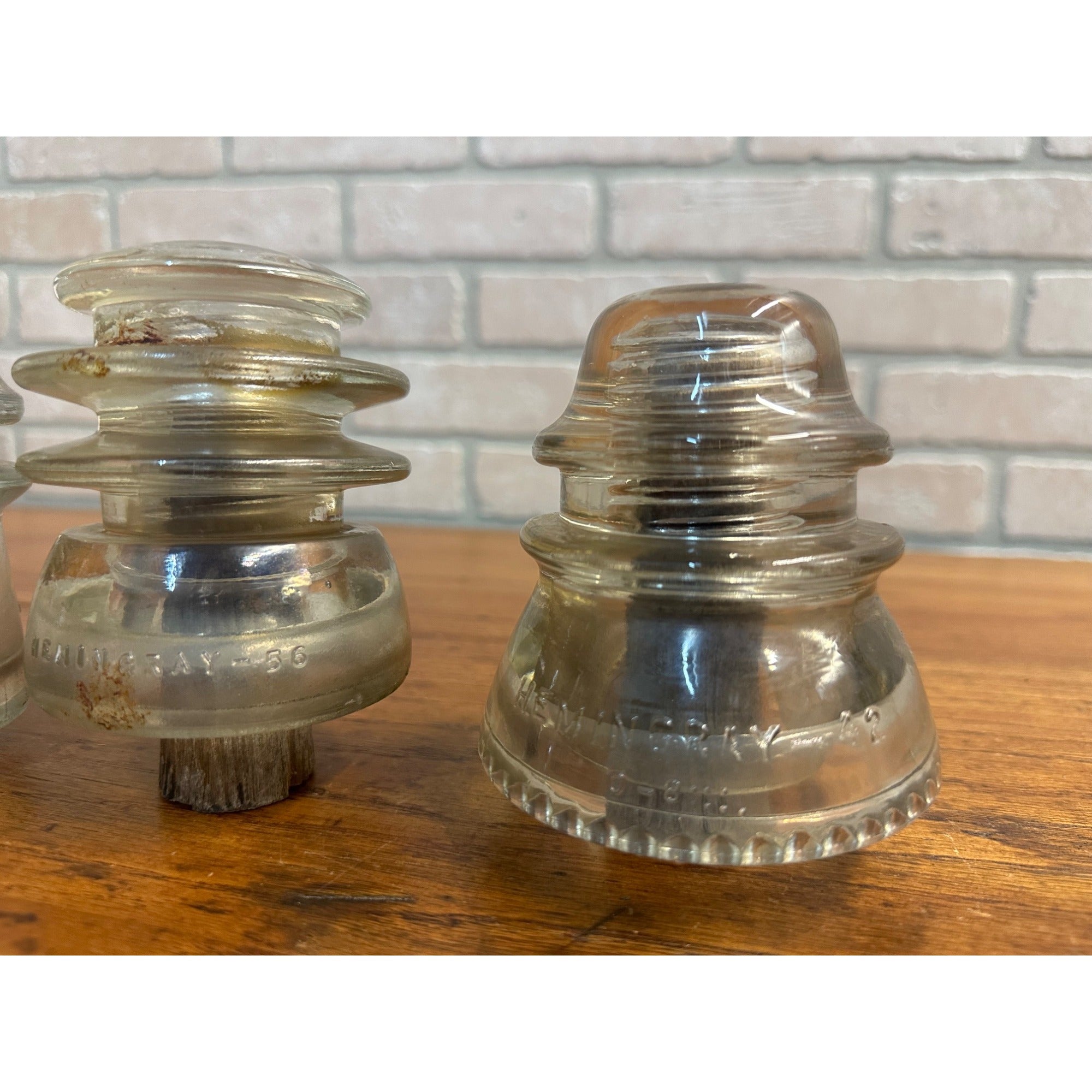 Antique Lot (3) Clear Glass Hemingray Insulators on Wood Pegs 16, 56, 42