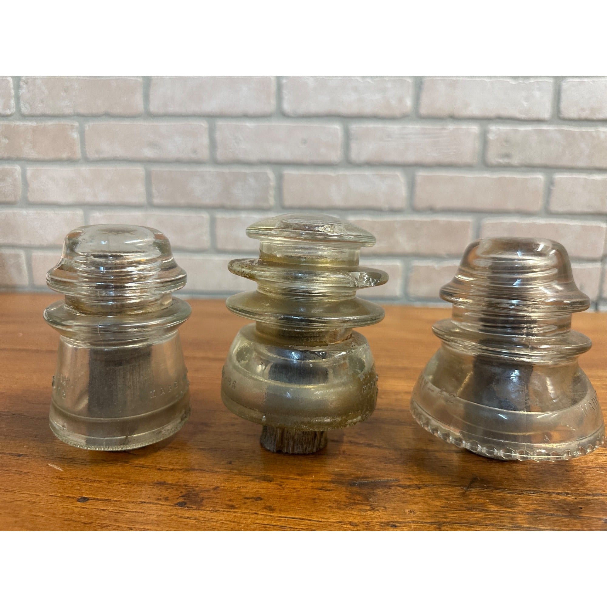 Antique Lot (3) Clear Glass Hemingray Insulators on Wood Pegs 16, 56, 42