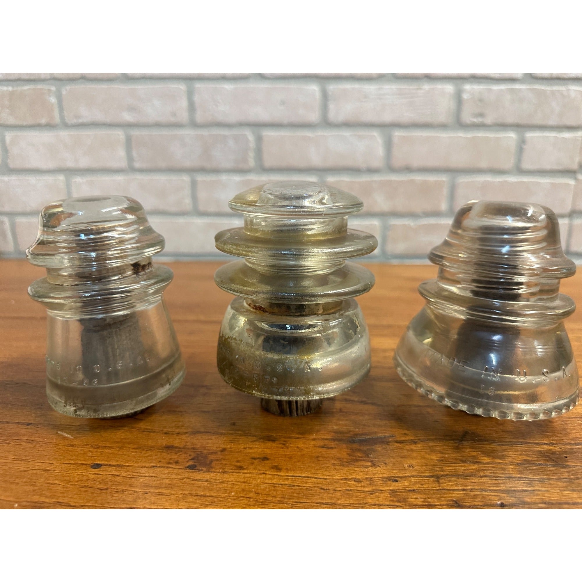 Antique Lot (3) Clear Glass Hemingray Insulators on Wood Pegs 16, 56, 42