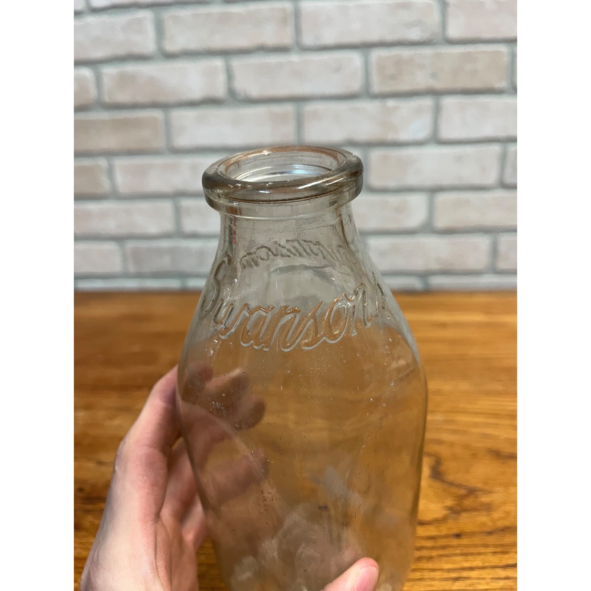 1948 Swanson's Dairy of Silvis Il Embossed Quart Milk Bottle Rock Island County