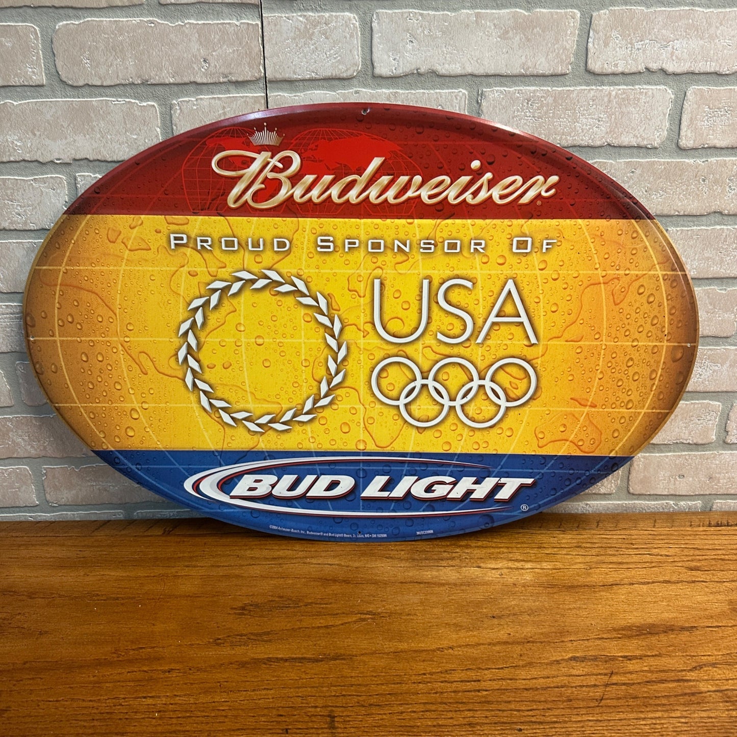 2004 BUDWEISER BUD LIGHT BEER TIN SIGN OLYMPICS PROUD SPONSOR MAN CAVE BAR