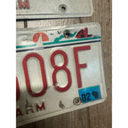 Vintage 2002  Wisconsin Embossed License Plate Red White Pair