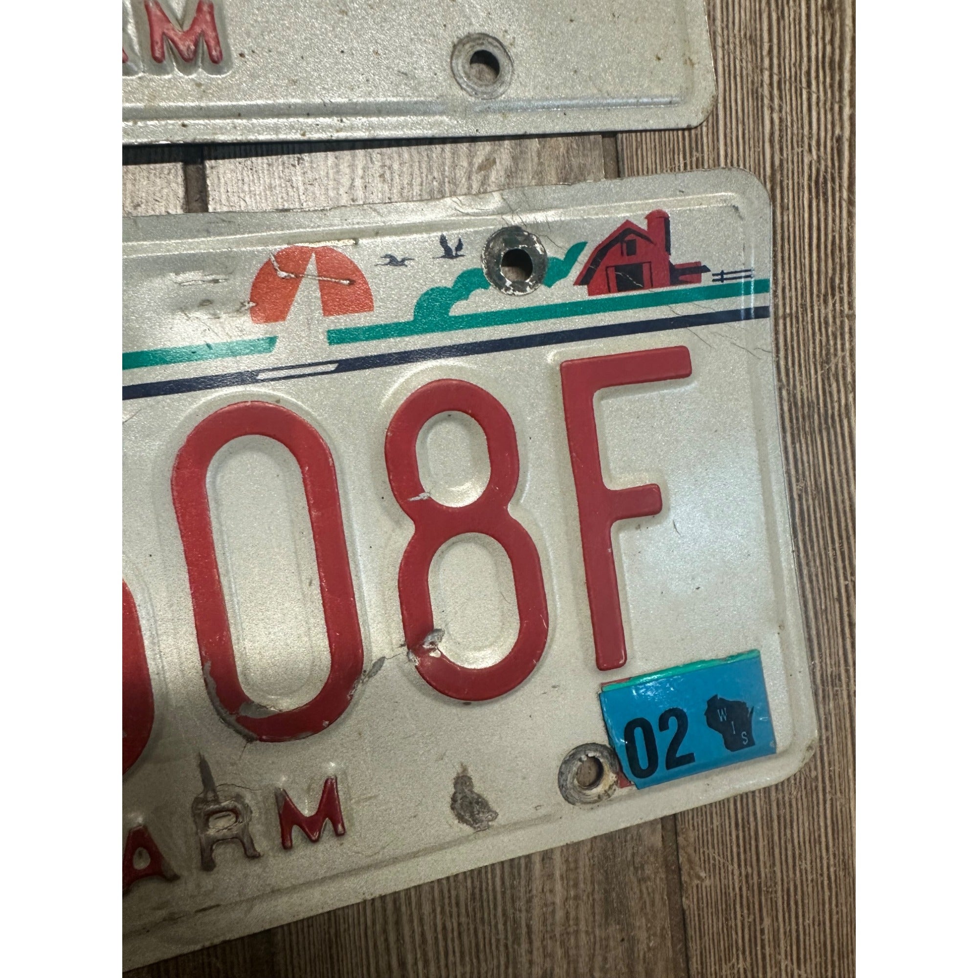 Vintage 2002  Wisconsin Embossed License Plate Red White Pair