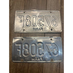 Vintage 2002  Wisconsin Embossed License Plate Red White Pair
