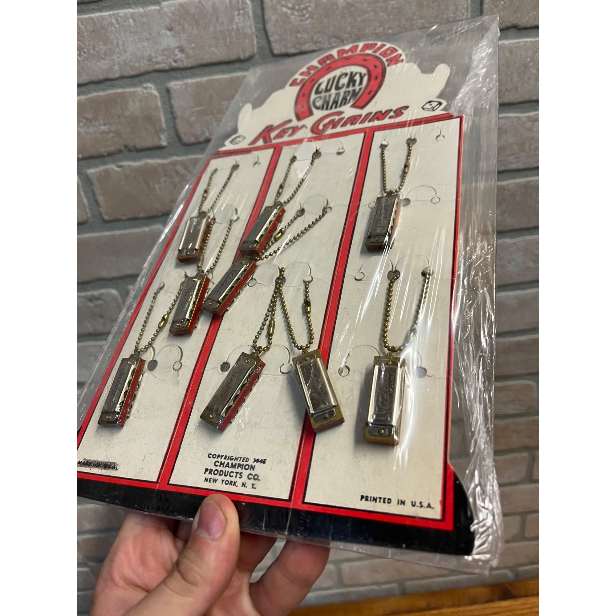 Vintage 1945 Champion Lucky Charm Harmonica Key Chain Store Display Sign
