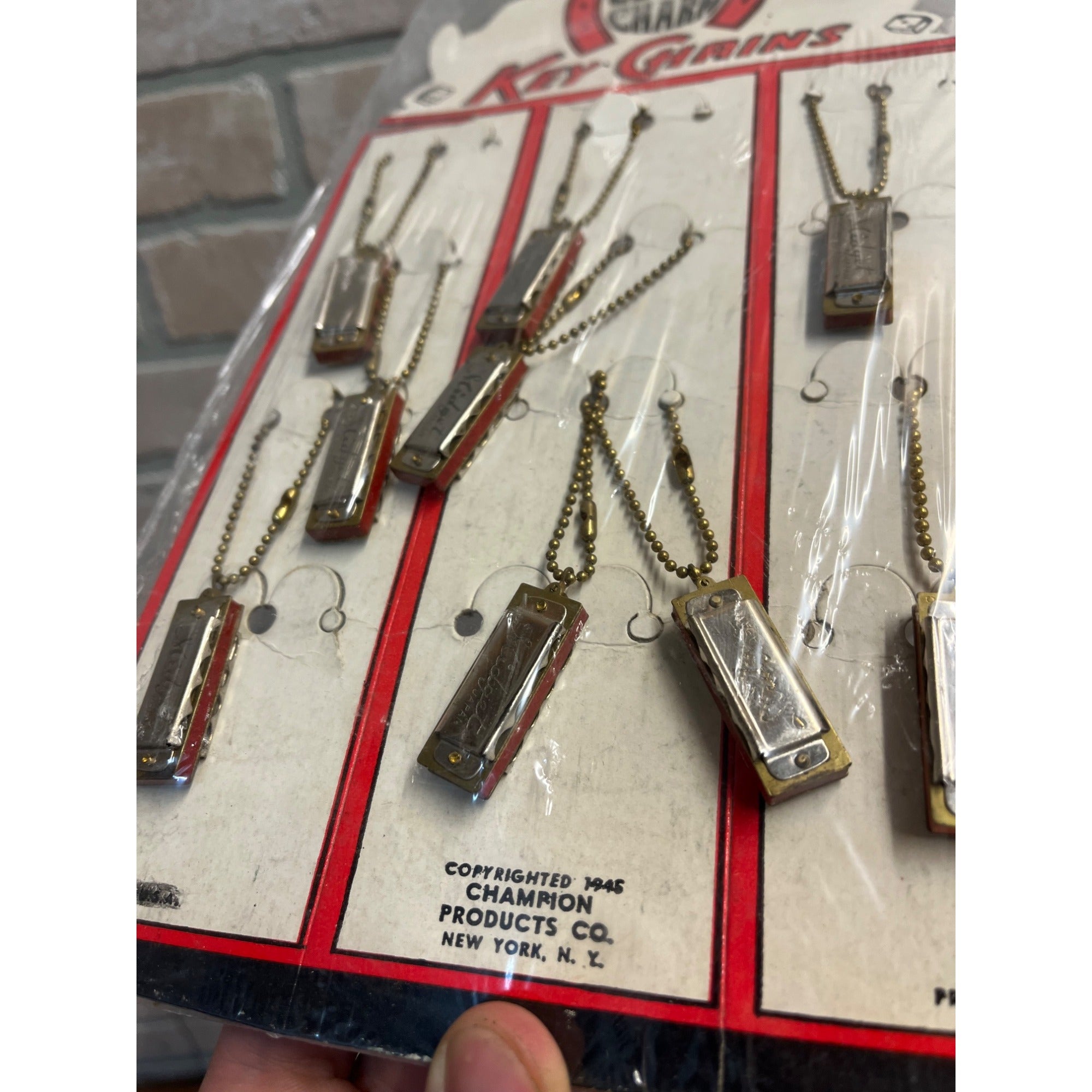 Vintage 1945 Champion Lucky Charm Harmonica Key Chain Store Display Sign