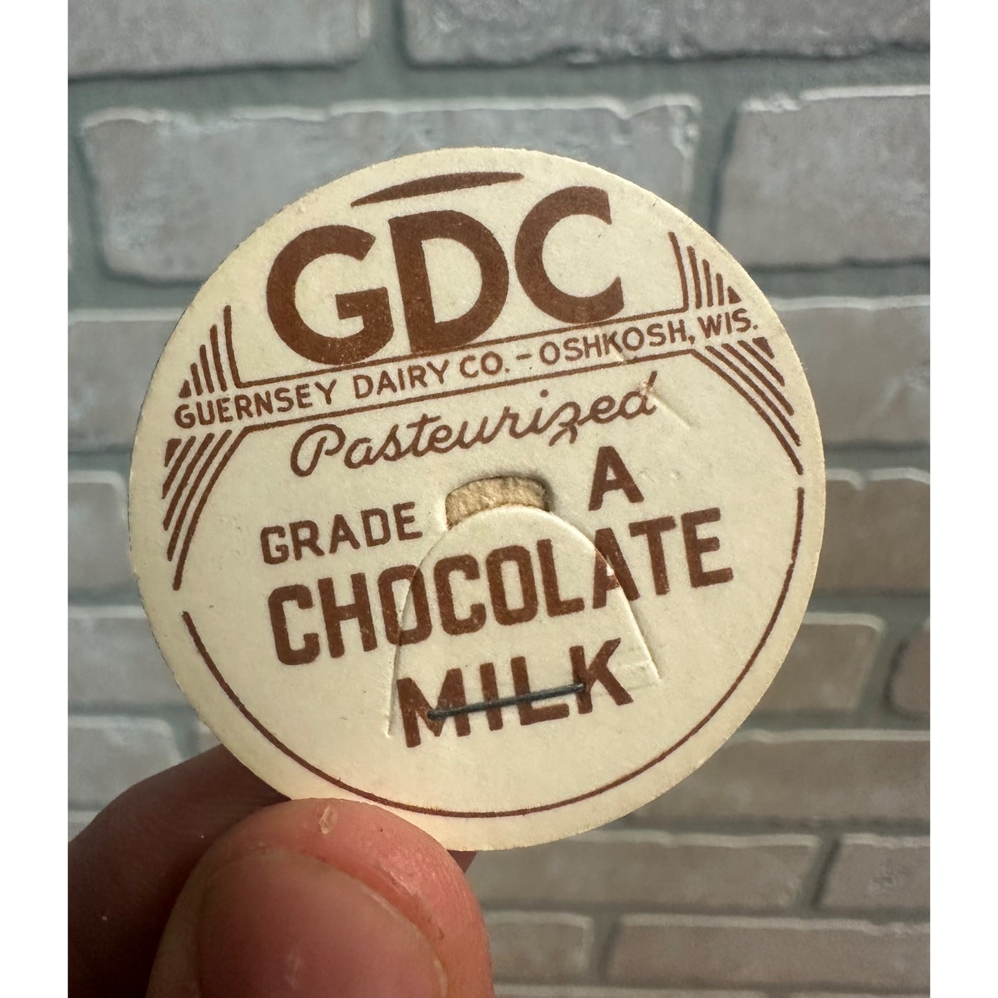 Milk Bottle Cap - Guernsey Dairy Co GDC - Oshkosh, (Wisconsin) Wis WI - Chocolate