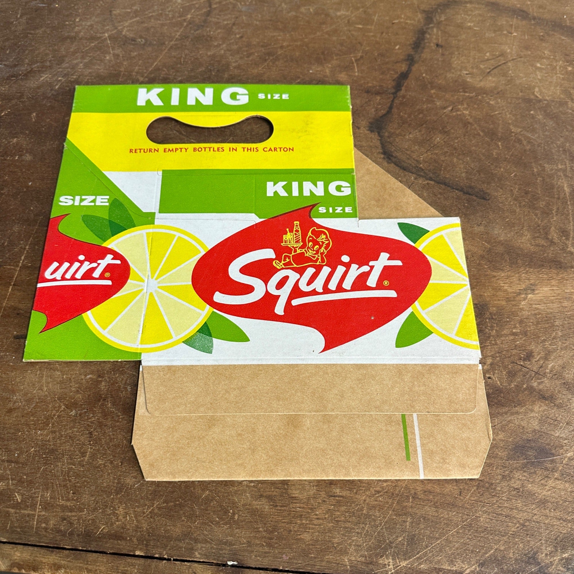 VINTAGE SQUIRT 6 PACK KING SIZE CARDBOARD CARRIER FOR 12OZ. BOTTLES NOS