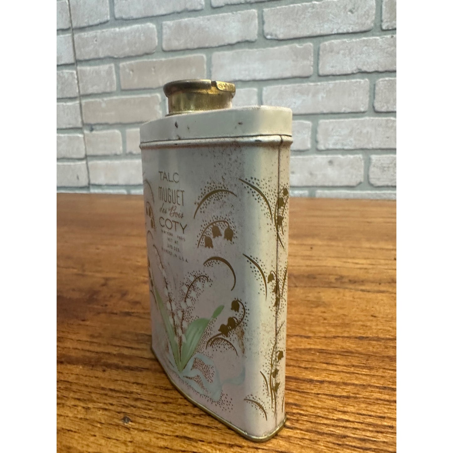 Vintage Muguet des bois COTY TALC TALCUM POWDER 3.7 Oz Graphic Tin Shaker Top