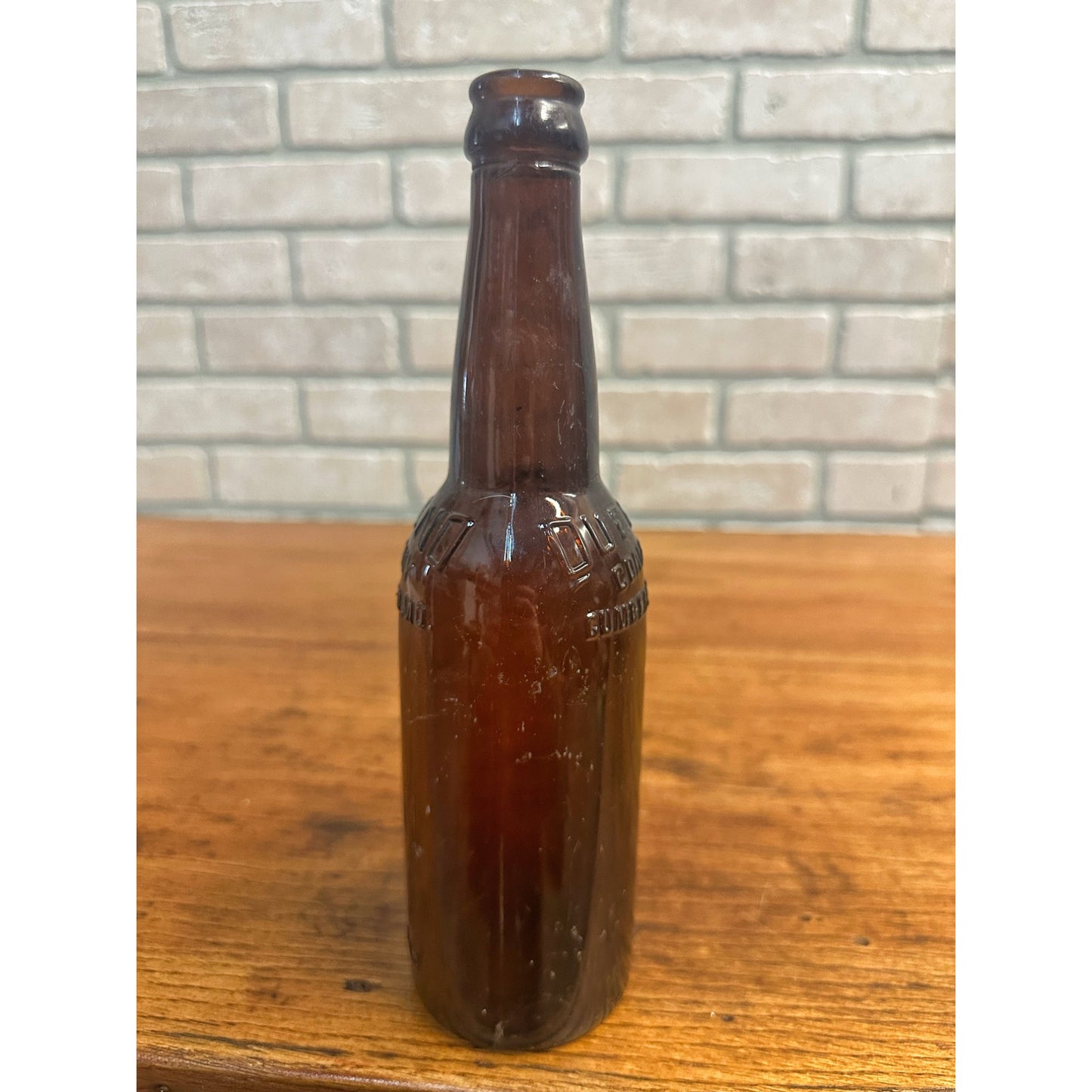 Queeno Brewing Co Cumberland MD Amber Brown Beer Bottle 12oz Embossed