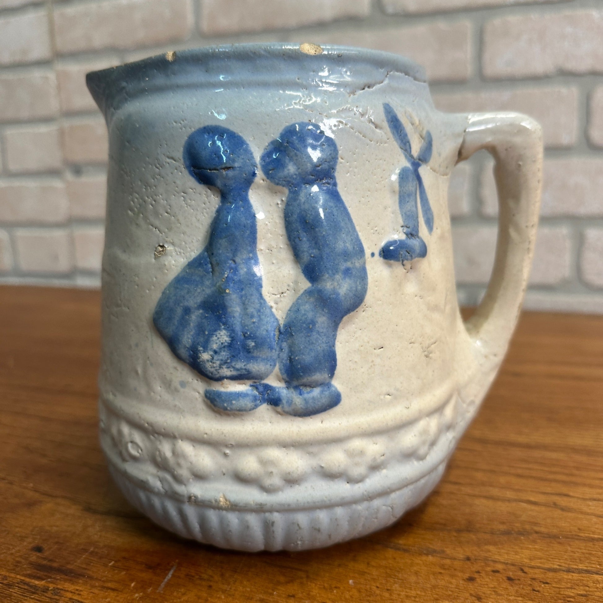 Antique 1916 Brush-McCoy Stoneware Pitcher with Kissing Dutch Children/Windmill