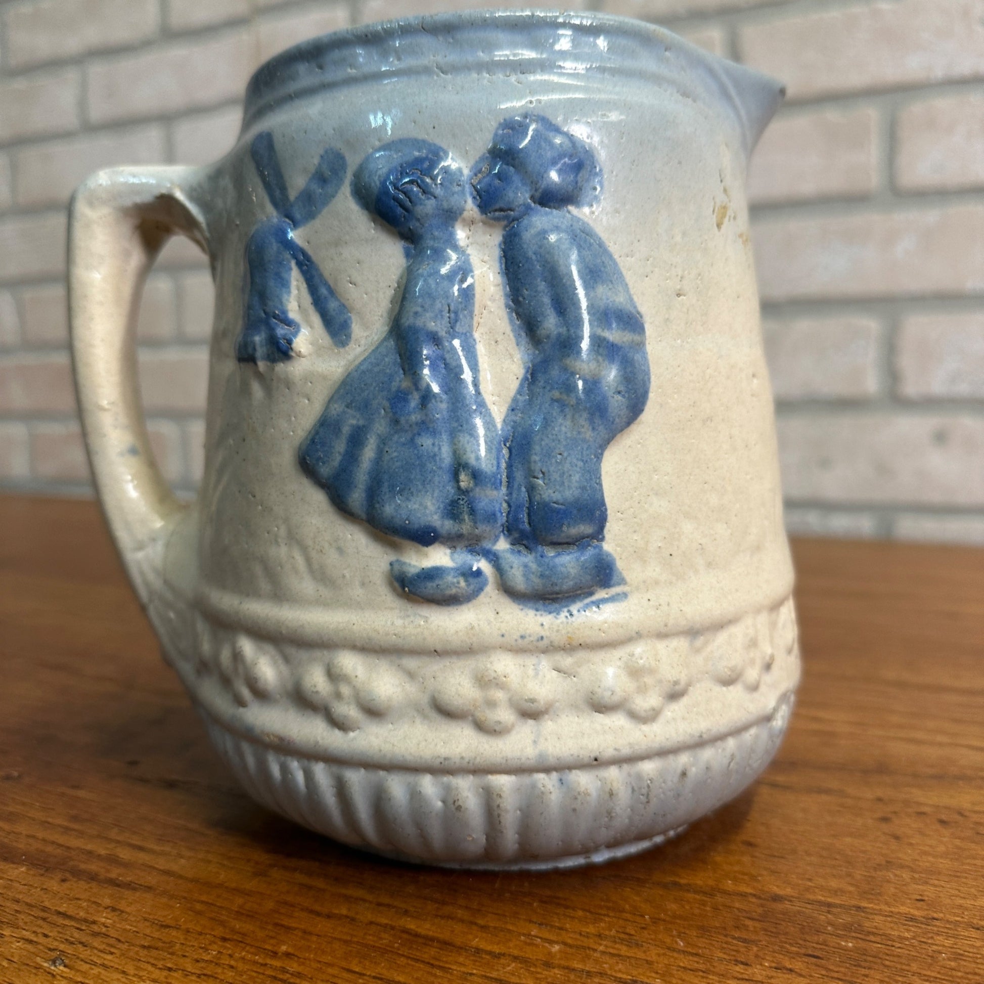 Antique 1916 Brush-McCoy Stoneware Pitcher with Kissing Dutch Children/Windmill