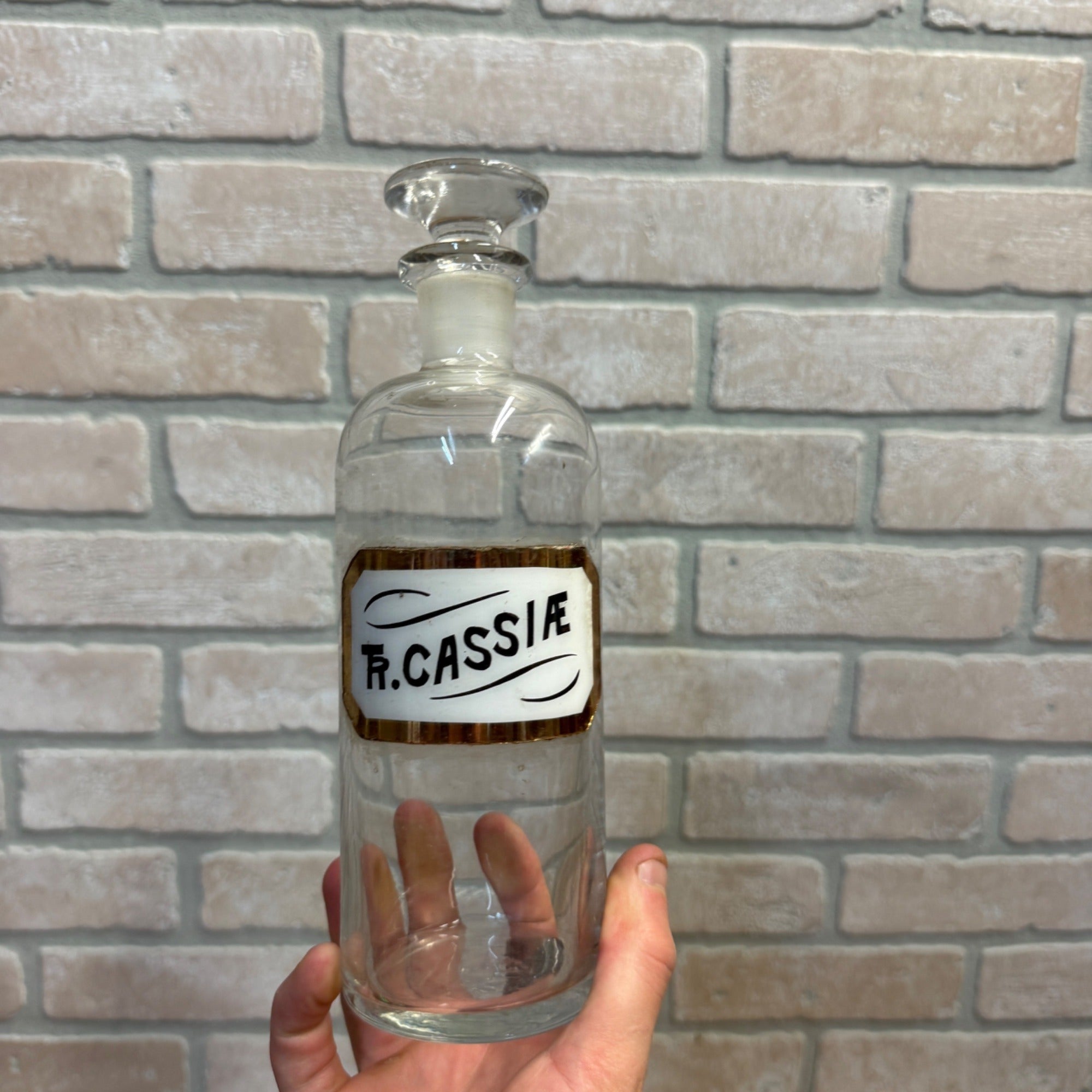 Vintage Glass Pharmacy Apothecary Bottle With Stopper and Glass Label Reading TR. Cassiae (Tincture of Cassia)