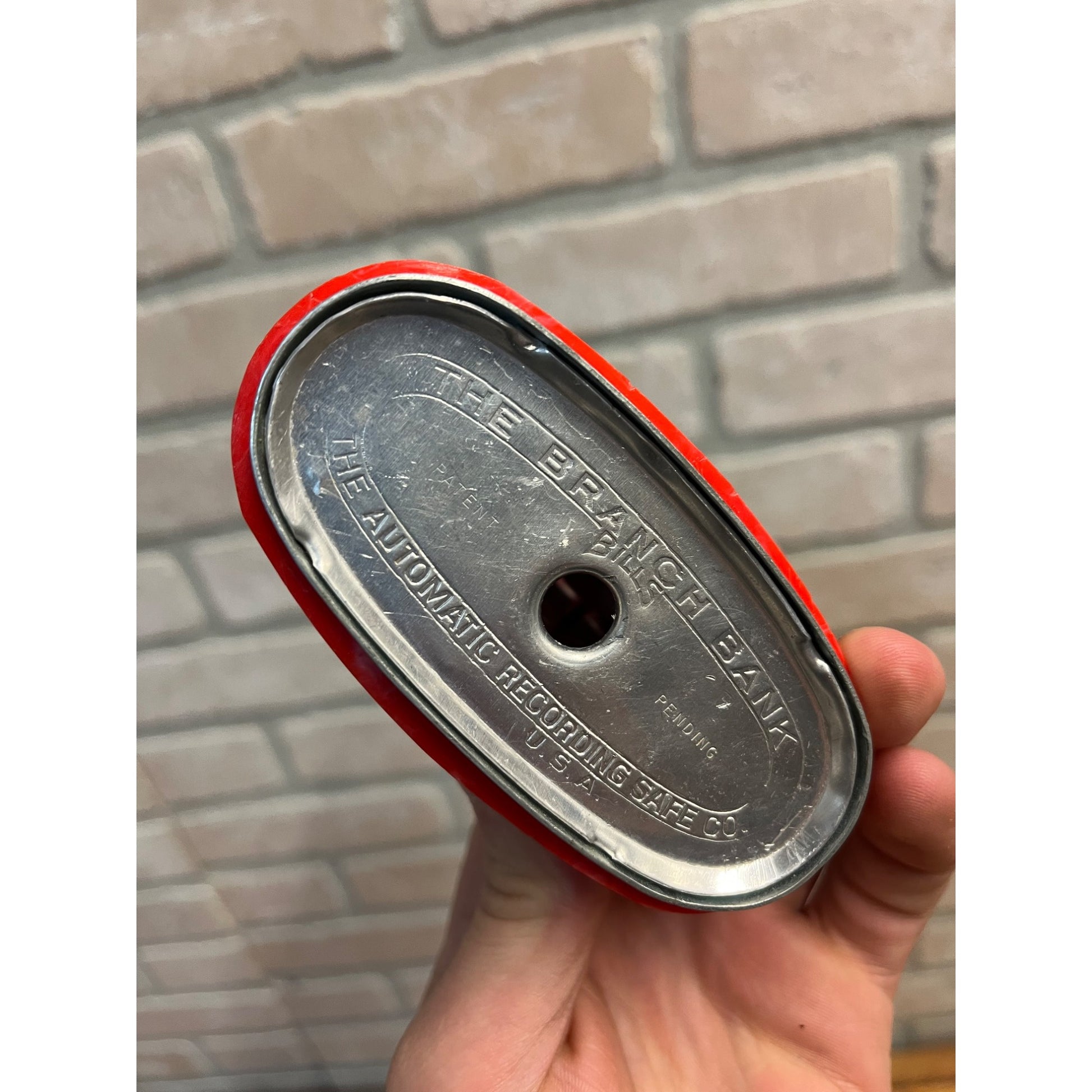 Vintage First National Bank West Bend Wisconsin Red Bakelite? Coin Bank - No Key