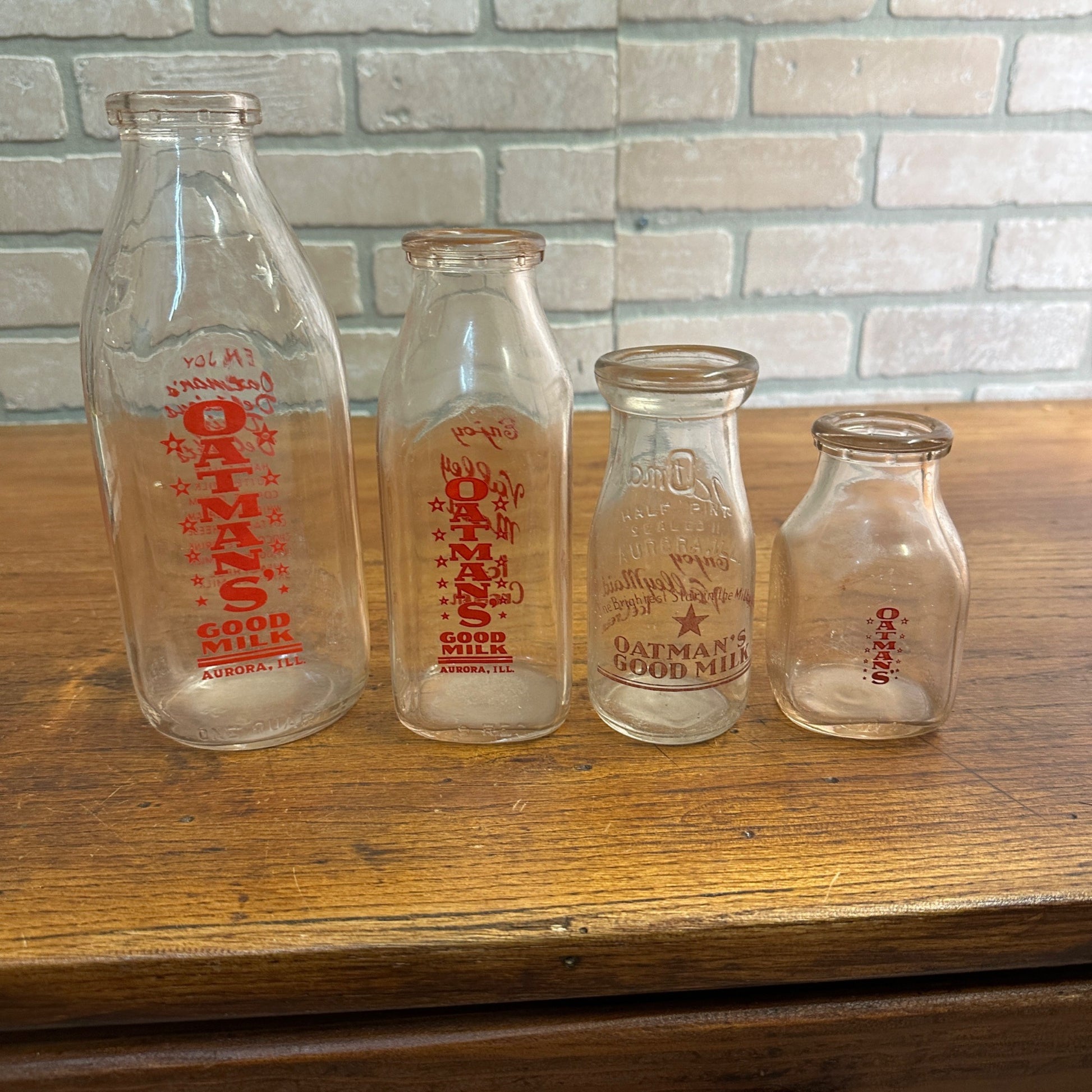 Lot of (4) Oatman Milk Bottles Valley Maid Ice Cream ACL Aurora IL