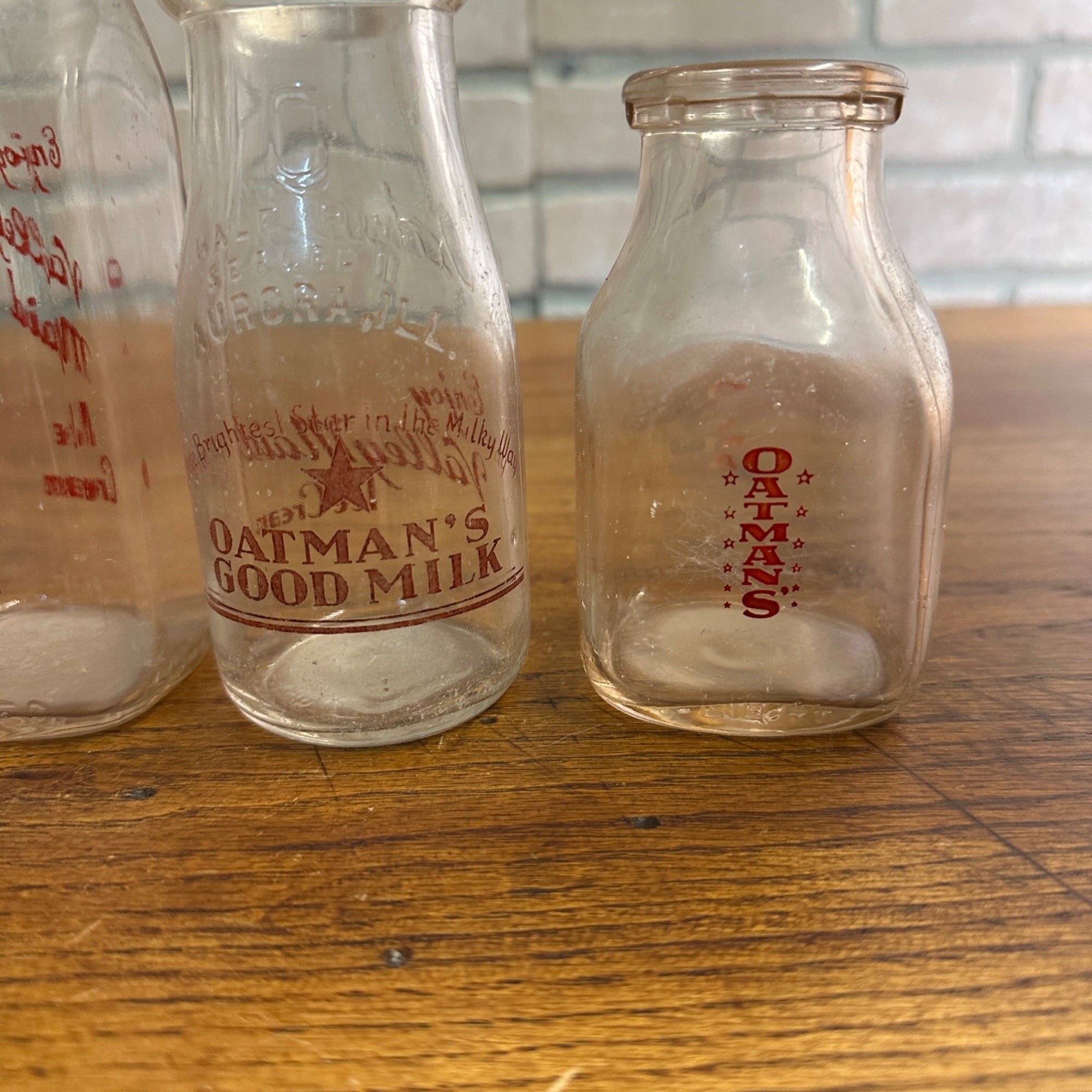 Lot of (4) Oatman Milk Bottles Valley Maid Ice Cream ACL Aurora IL