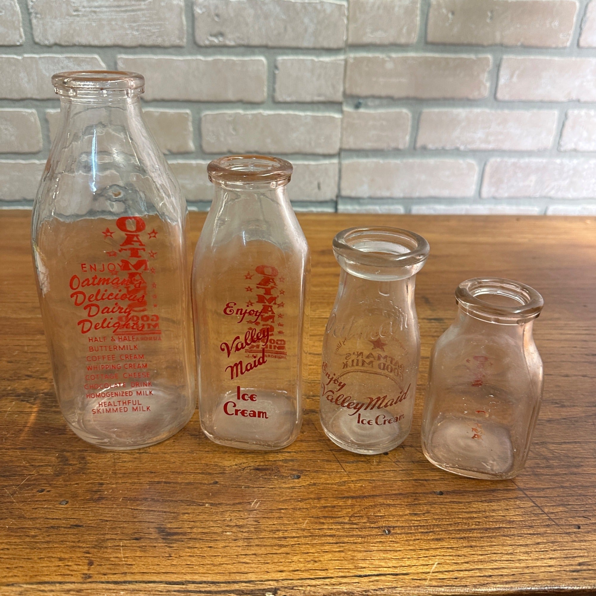 Lot of (4) Oatman Milk Bottles Valley Maid Ice Cream ACL Aurora IL