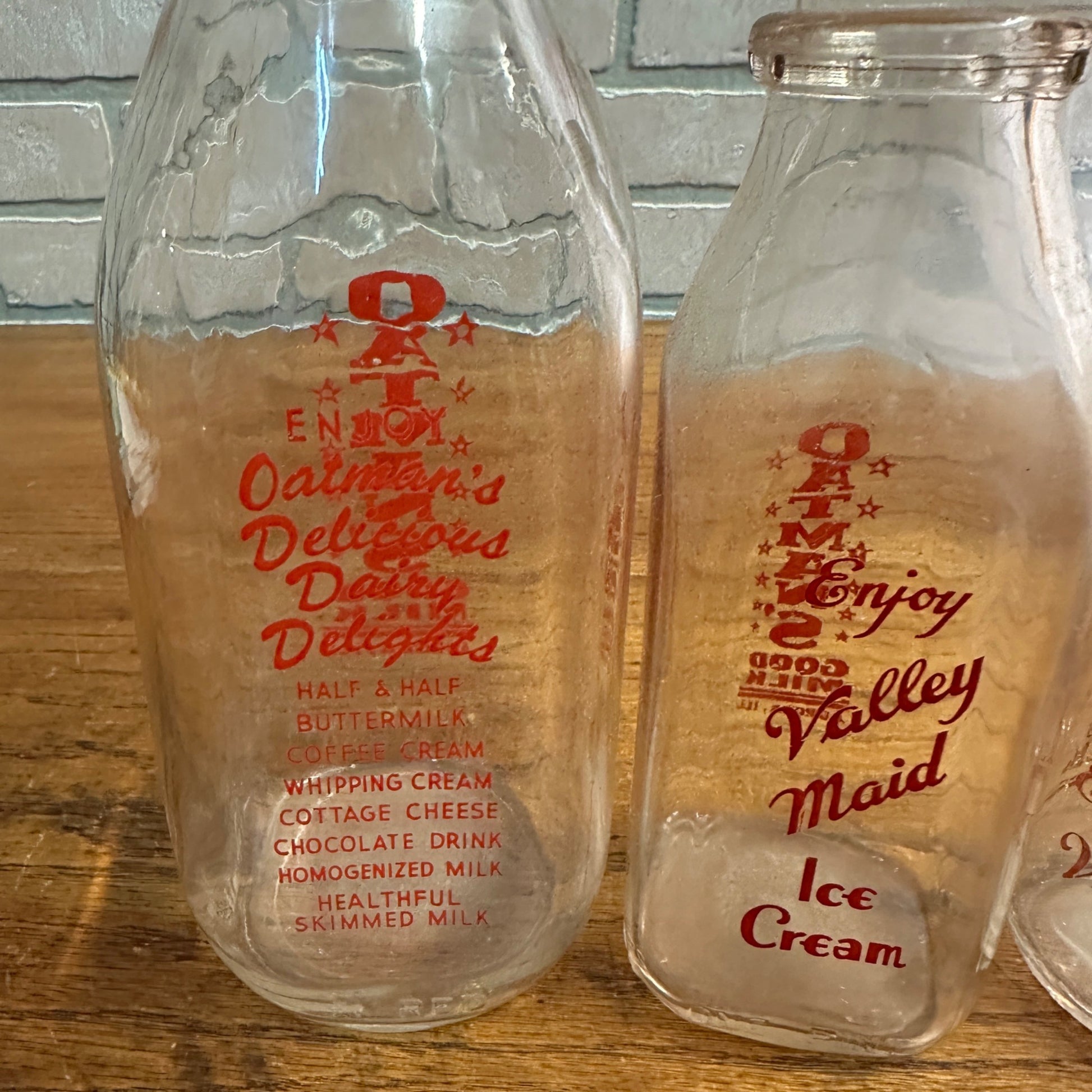 Lot of (4) Oatman Milk Bottles Valley Maid Ice Cream ACL Aurora IL