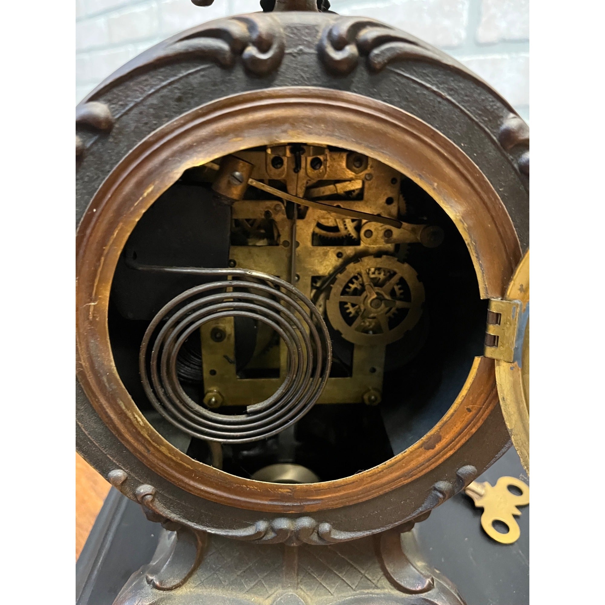 Antique New Haven Bronze Figural Mantle Clock Silversmith Shoemaker 8 Day Time & Strike Gong Clock