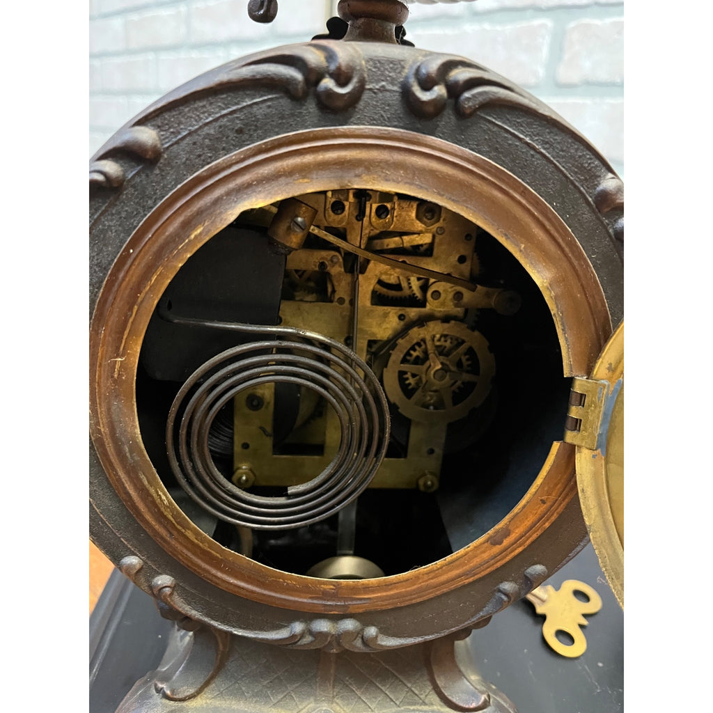 Antique New Haven Bronze Figural Mantle Clock Silversmith Shoemaker 8 Day Time & Strike Gong Clock