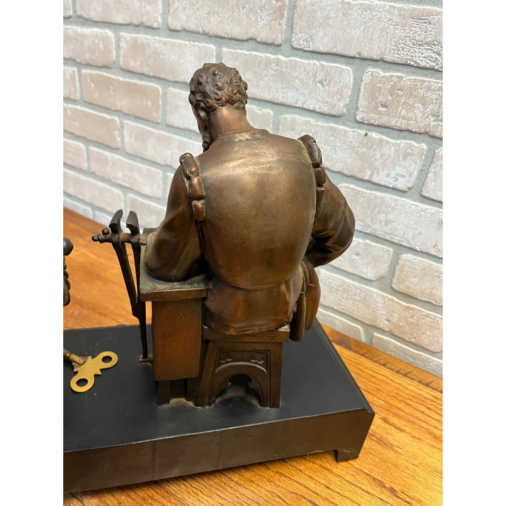 Antique New Haven Bronze Figural Mantle Clock Silversmith Shoemaker 8 Day Time & Strike Gong Clock
