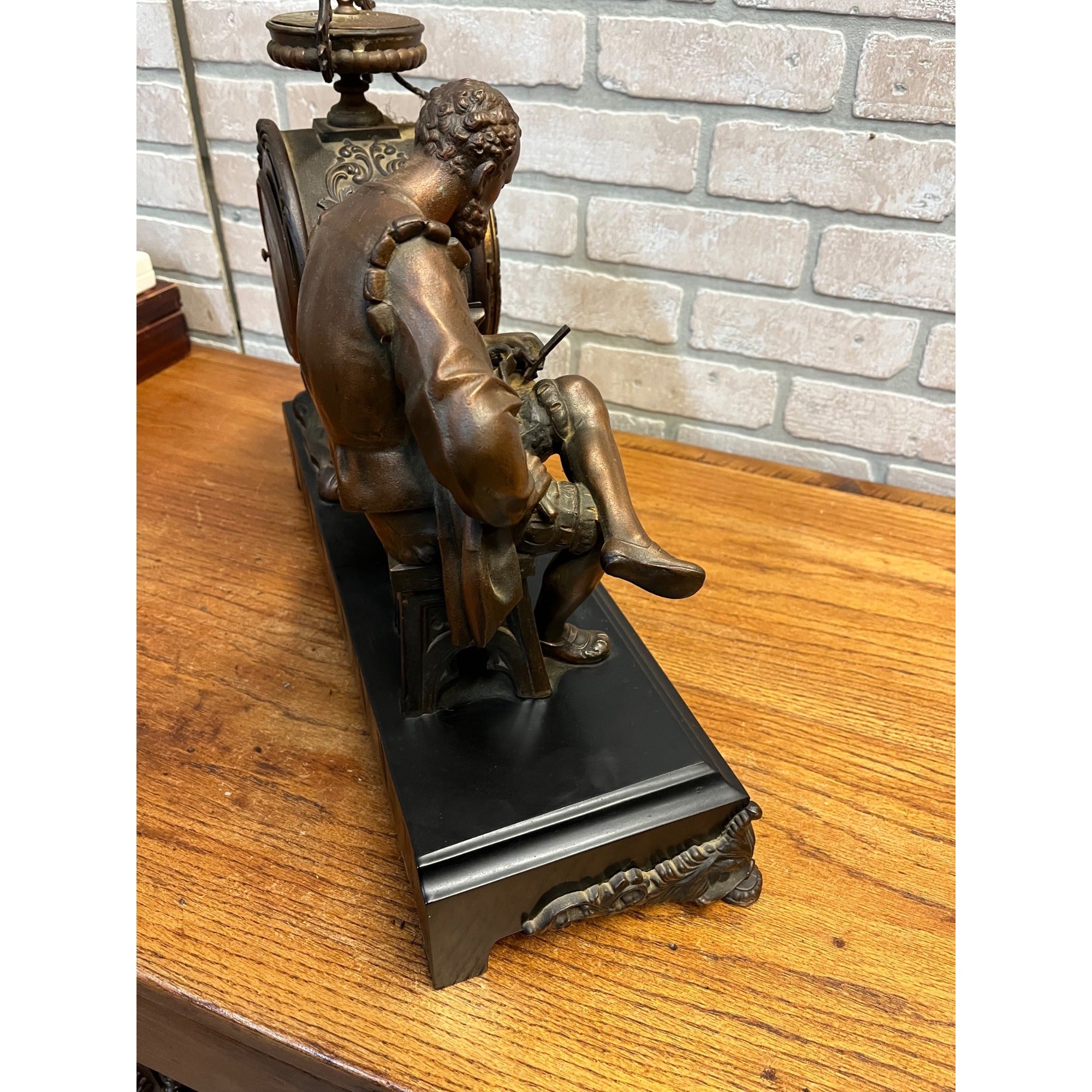 Antique New Haven Bronze Figural Mantle Clock Silversmith Shoemaker 8 Day Time & Strike Gong Clock