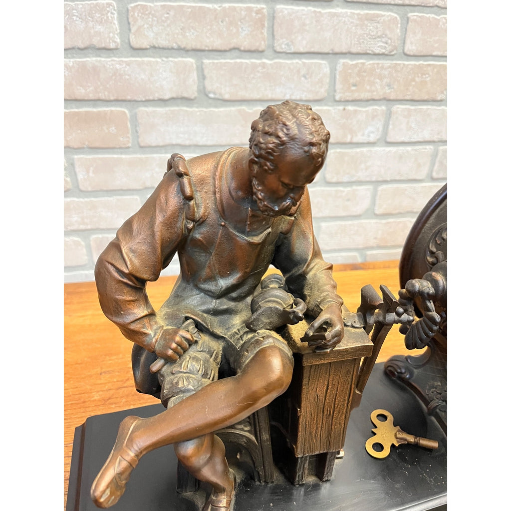 Antique New Haven Bronze Figural Mantle Clock Silversmith Shoemaker 8 Day Time & Strike Gong Clock