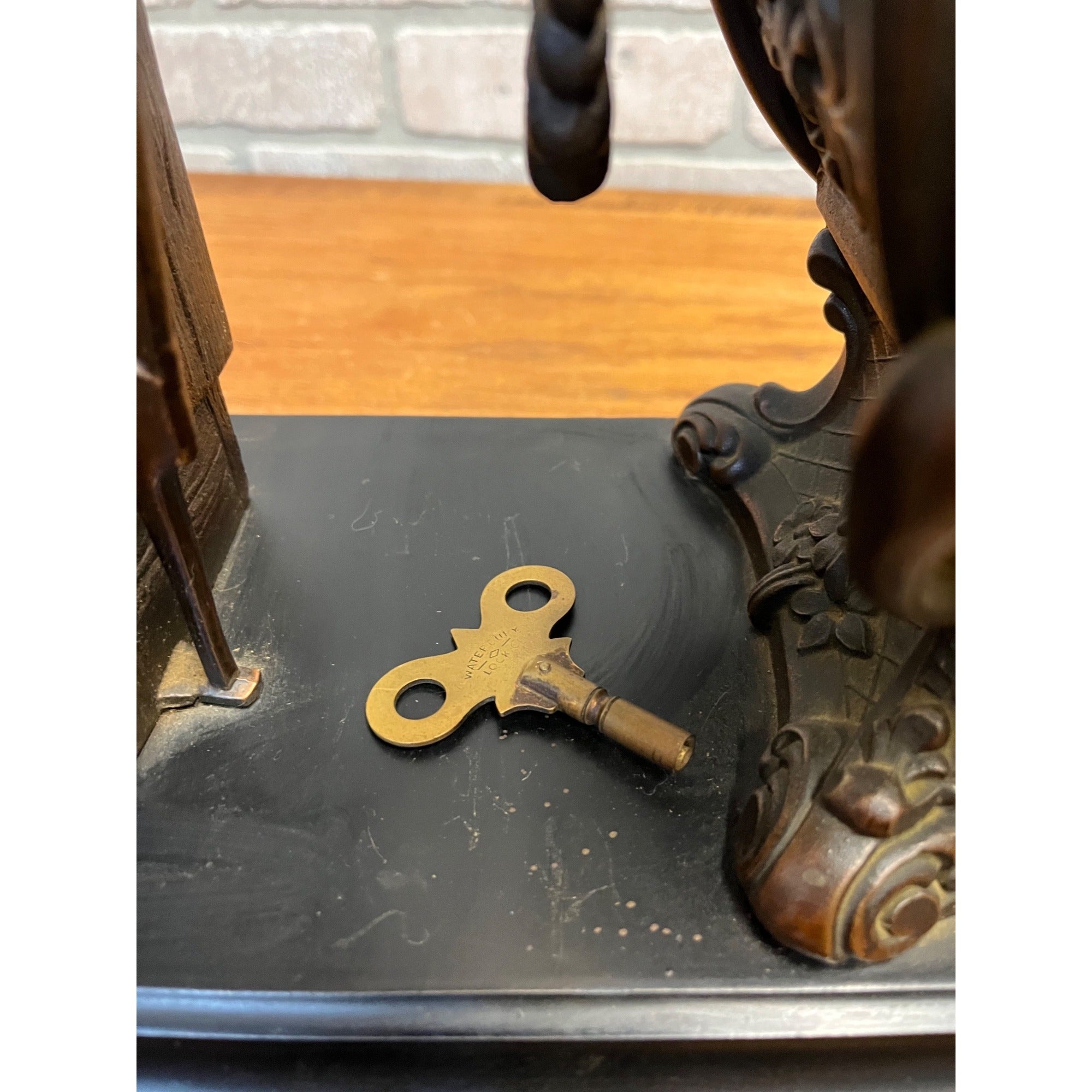 Antique New Haven Bronze Figural Mantle Clock Silversmith Shoemaker 8 Day Time & Strike Gong Clock