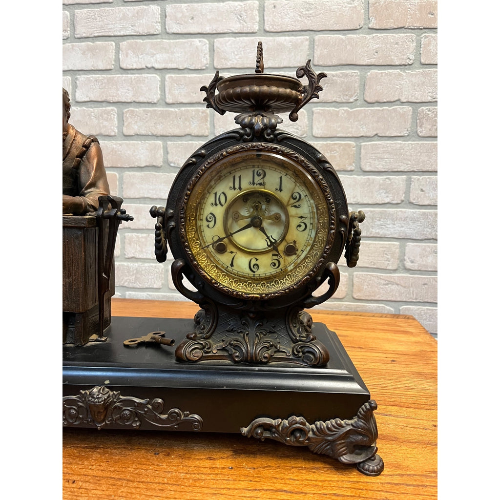 Antique New Haven Bronze Figural Mantle Clock Silversmith Shoemaker 8 Day Time & Strike Gong Clock
