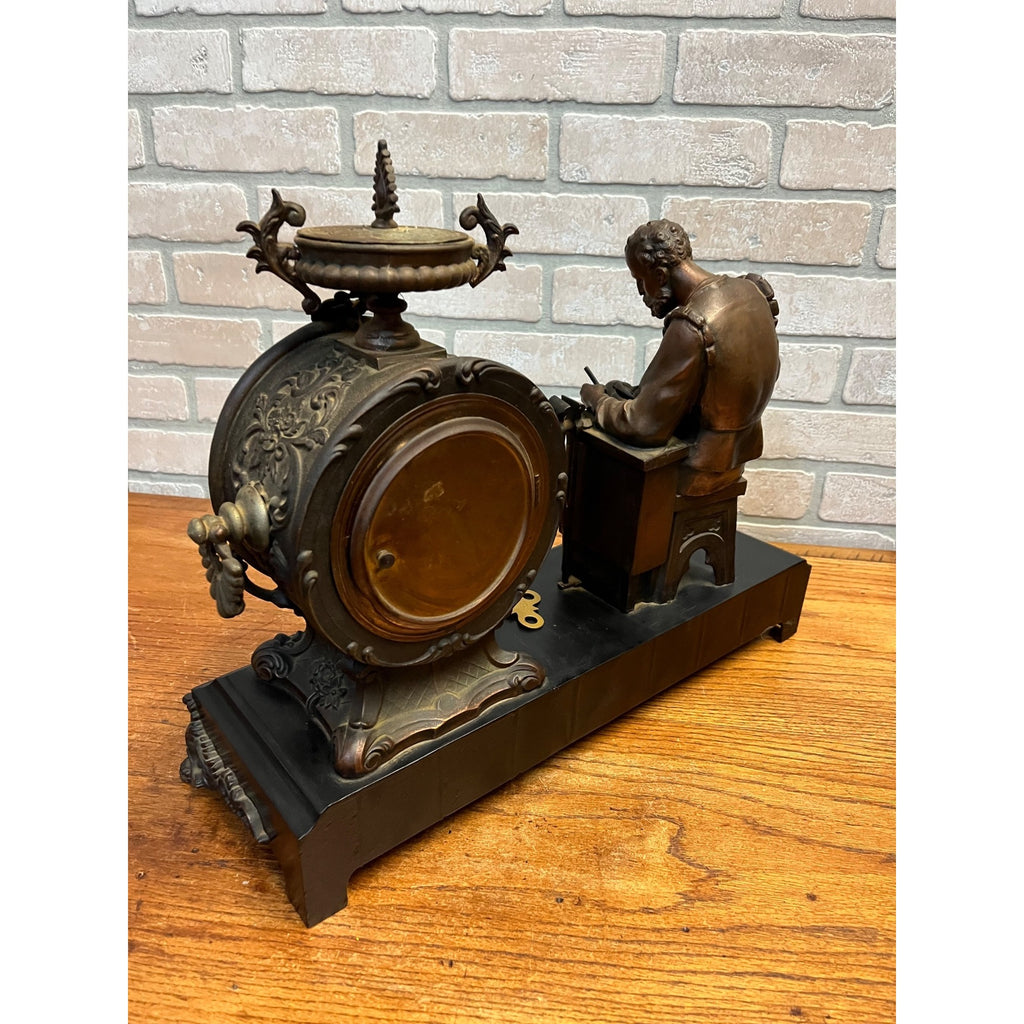 Antique New Haven Bronze Figural Mantle Clock Silversmith Shoemaker 8 Day Time & Strike Gong Clock